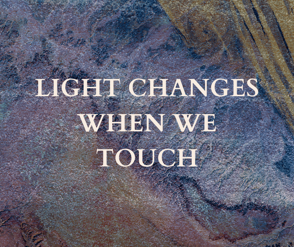 Cream text over a grainy, speckled surface in pastels of purples, pinks, blues and yellows with a diagonal dark line, small blue veins and thick yellow lines in the top right corner. Text reads: LIGHT CHANGES WHEN WE TOUCH
